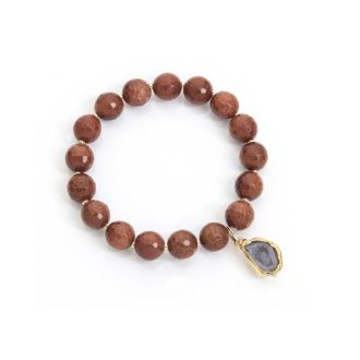 Gemstone stretch bracelet with gold geode charm.