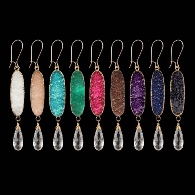 Nine color options for Caribbean Cove earrings featuring oval sugar druzy stones in white, peach, turquoise, green, hot pink, bronze, purple, royal blue, and black, each with a wire-wrapped clear crystal teardrop pendant.