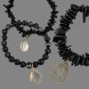 black bracelet with charms