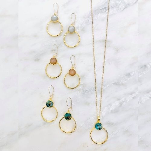 gold jewelry set with gemstones