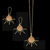 Peach and gold jewelry set.