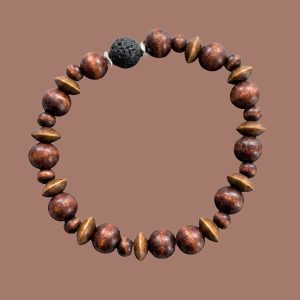 Beaded aromatherapy bracelet with brown wooden beads and a black lava rock centered on a solid brown background.