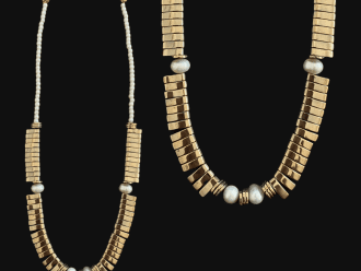 metal necklace with pearl spacers