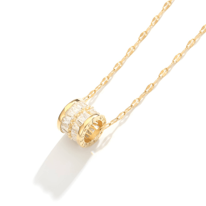 Gold Waterproof Necklace with Sparkling Crystal Pendant Gold waterproof necklace featuring a sparkling crystal pendant.