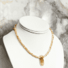 tulum crystal point neckalce 3-min Short crystal point necklace on white bust.