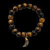 Tigers eye gemstone bracelet with labradorite horn charm.