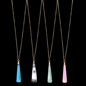 Gemstone teardrop pendant necklaces in sky blue chalcedony, dendritic opal, amazonite, and rose chalcedony, set on delicate gold chains.