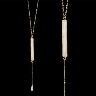 White druzy bar lariat necklace with gold chain and crystal drop, featuring a shimmering natural gemstone.