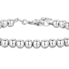 Close-up of minimalist waterproof silver bead bracelet with fine chain, perfect for layering or solo wear.