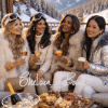 Women sitting at a ski resort having apres ski wearing Chelsea Bond Jewelry