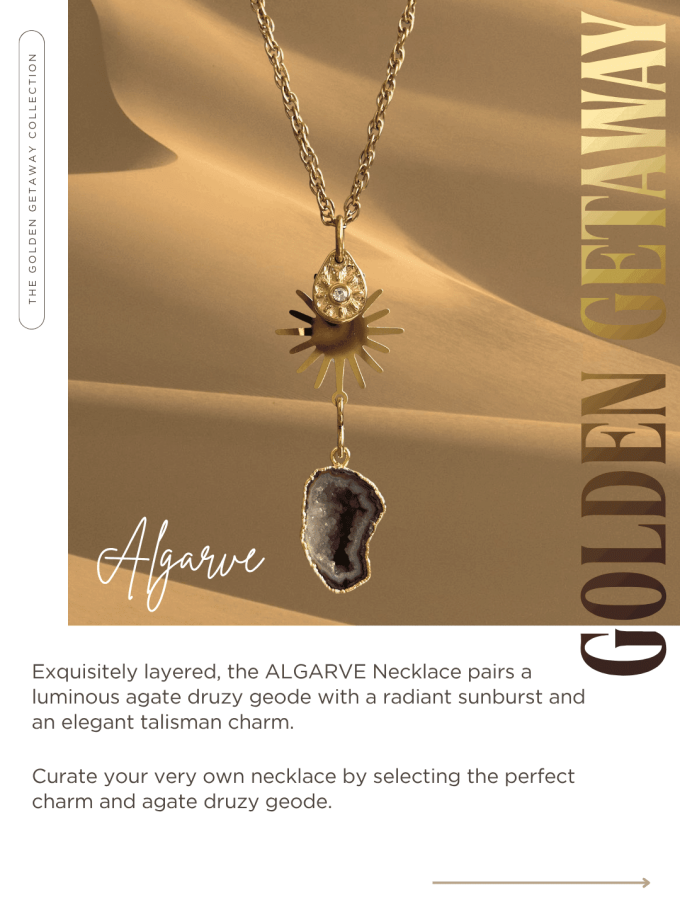 wholesale-spa-jewelry-algarve-gold-sunburst-druzy-necklace Product showcase image for the Algarve Necklace from the Golden Getaway Collection, featuring a gold link chain layered with a crystal sun drop charm, a multi-ray sunburst medallion, and a dark gold-rimmed agate druzy geode slice pendant on a warm sandy background with wholesale ordering text below.