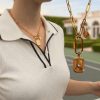 Pickleball necklace with carabiner clasp by Chelsea Bond Jewelry.